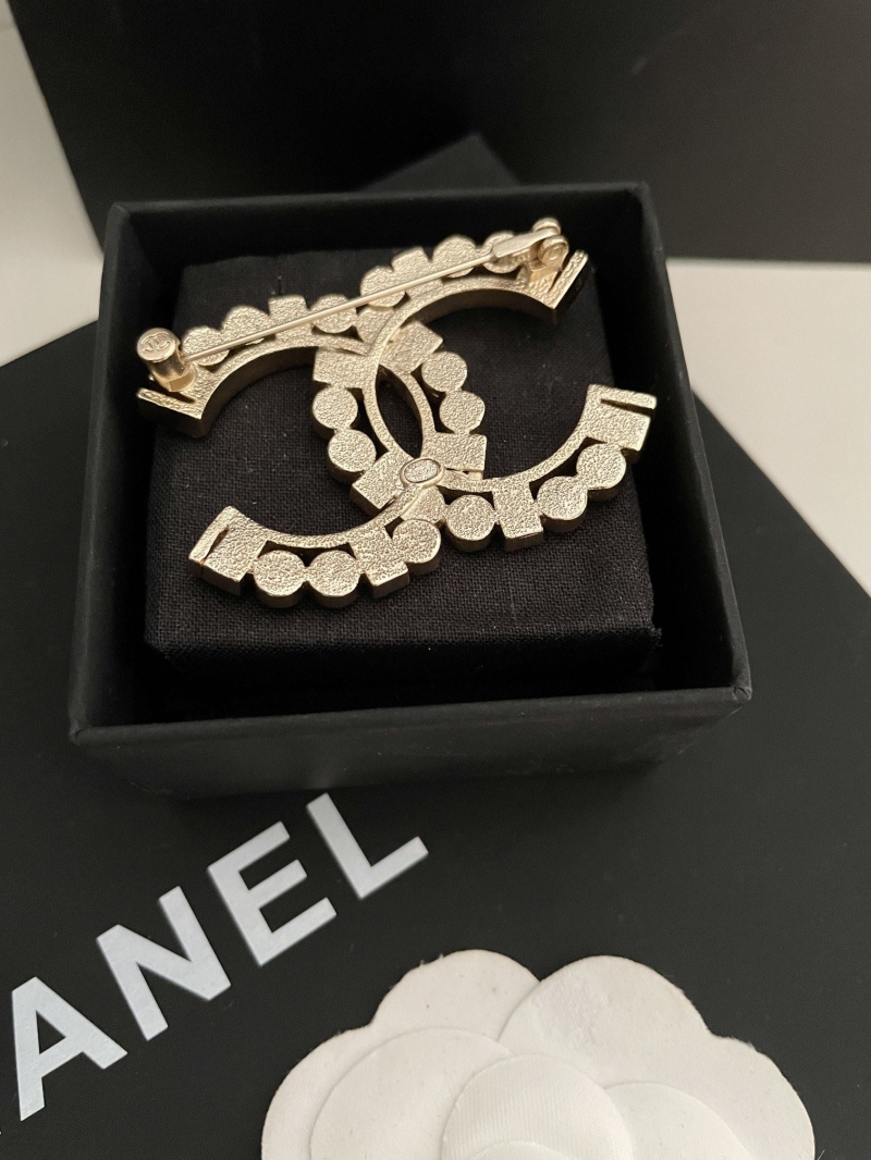 Ch**el brooches